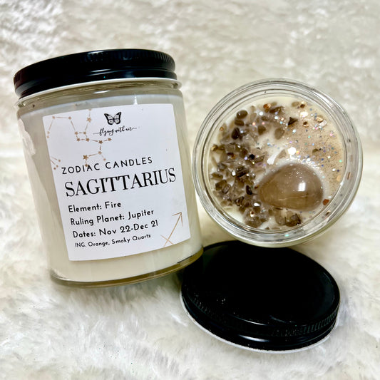 Sagittarius Zodiac Candle A delightful soy based, magical candle for your relaxation and fulfillment of confidence in accordance to your zodiac sign.  Product Properties  Volume: 6 oz glass jar  Burn Time: 10-15 hours  Primary Color: White  Scent: Orange Crystal Energy: Smoky Quartz Tumbled, Smoky Quartz Chips